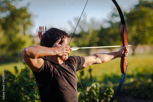 Photo: Young archer training with the bow Young archer training with the bow