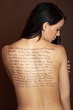 the back of a young woman with text