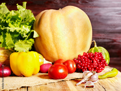 Photo: Vegetable on wooden boards. Vegetable on wooden boards.