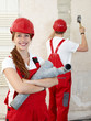 Young worker fixing up a house, working in a building lot