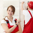 Young couple have fun to renovate their bathroom
