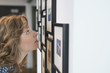 Interior designer looking at a painting
