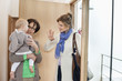 Woman waving to her daughter
