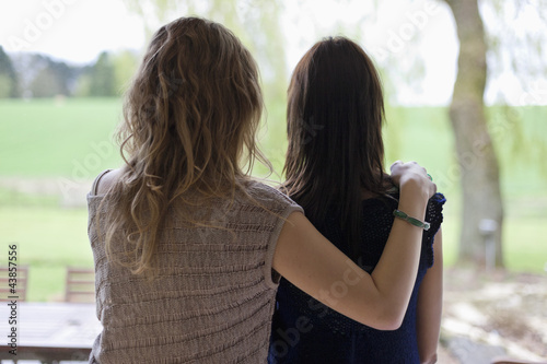Photo: Rear view of a woman with her mother Rear view of a woman with her mother