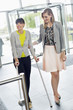 Woman helping a disabled woman in walking