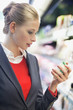 Woman shopping in a supermarket