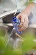 Man filling a bottle with water in the kitchen