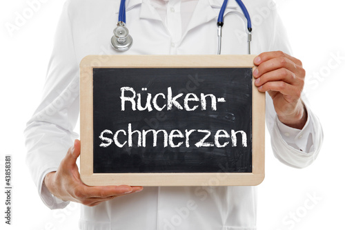 Foto: Arzt mit Tafel Rückenschmerzen Arzt mit Tafel Rückenschmerzen