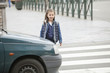 Photo: Schoolgirl crossing a road Schoolgirl crossing a road