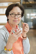 Woman taking medicine
