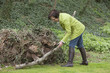 Woman cleaning her garden