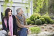 Couple sitting in a garden