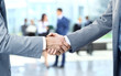 Close up of businessmen shaking hands
