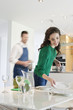 Couple preparing to serve dinner
