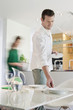 Couple preparing to serve dinner