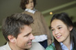 Man sitting with his daughter at home