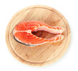 Red fish with on wooden cutting board isolated on white.