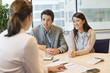 Business executive discussing with her clients