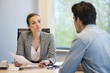 Business executive discussing with her client