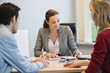 Business executive discussing with her clients
