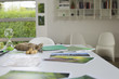 Ecology sustainable development related photographs on a table