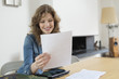 Woman sorting out bills