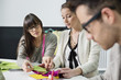 Fashion designers working in an office