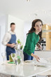 Couple preparing to serve dinner