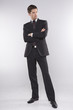 fashion shot of an elegant young man wearing suit