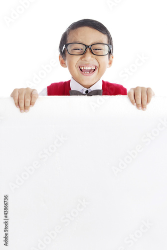 Photo: Cheerful pupil with copyspace Cheerful pupil with copyspace