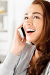 Photo: Pretty young woman using mobile phone Pretty young woman using mobile phone