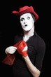 Mime in a red cowboy hat