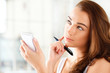 Foto: Attractive young student planning ahead Attractive young student planning ahead