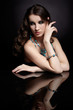 brunette woman and mirror