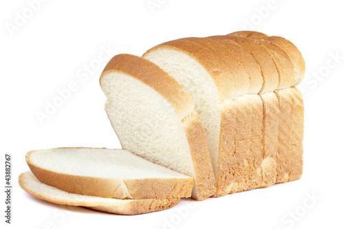 Photo: cut of loaf bread on white cut of loaf bread on white