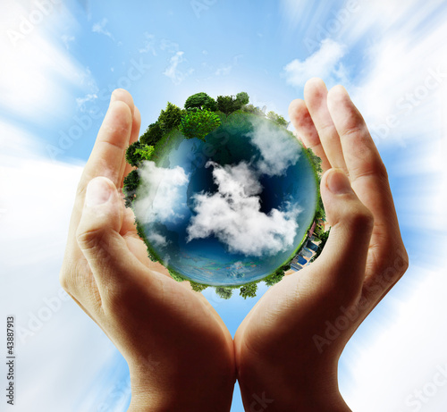 Illustration: earth globe in his hands earth globe in his hands