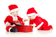 two funny small kids in Santa Claus clothes with gift box