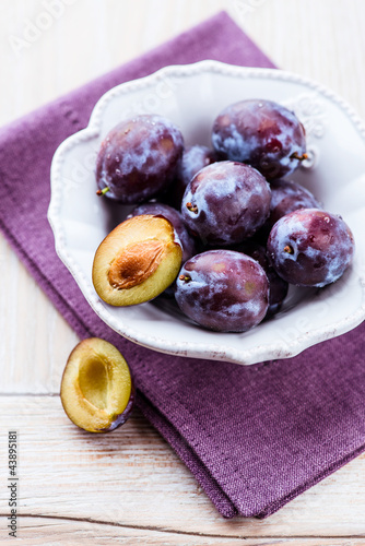Photo: Fresh plums in a bowl Fresh plums in a bowl