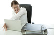 young brunette business woman in rage and throw laptop of desk