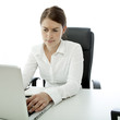 Photo: young brunette woman is uncertain on her desk young brunette woman is uncertain on her desk