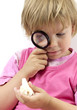 Girl with magnifying glass