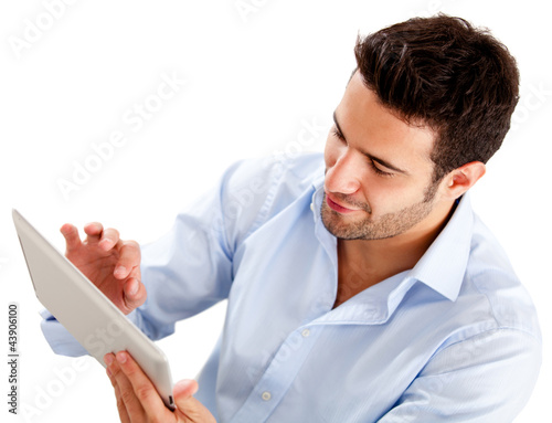 Photo: Businessman using a tablet computer Businessman using a tablet computer