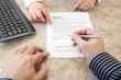 Photo: Signing a Contract in the Office Signing a Contract in the Office