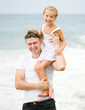 fatherand daughter on his shoulder