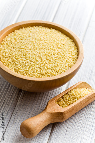 Photo: couscous in wooden bowl couscous in wooden bowl