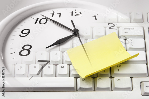 Photo: Clock and Computer Keyboard Clock and Computer Keyboard