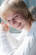 happy laughing middle-age woman in white