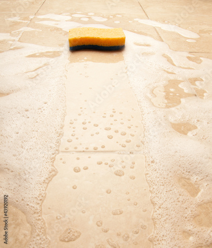 Photo: House cleaning with sponge House cleaning with sponge
