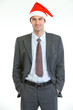 Photo: Portrait of smiling businessman in Santa's hat Portrait of smiling businessman in Santa's hat