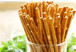 salty pretzel snack bread sticks in a glass on the table